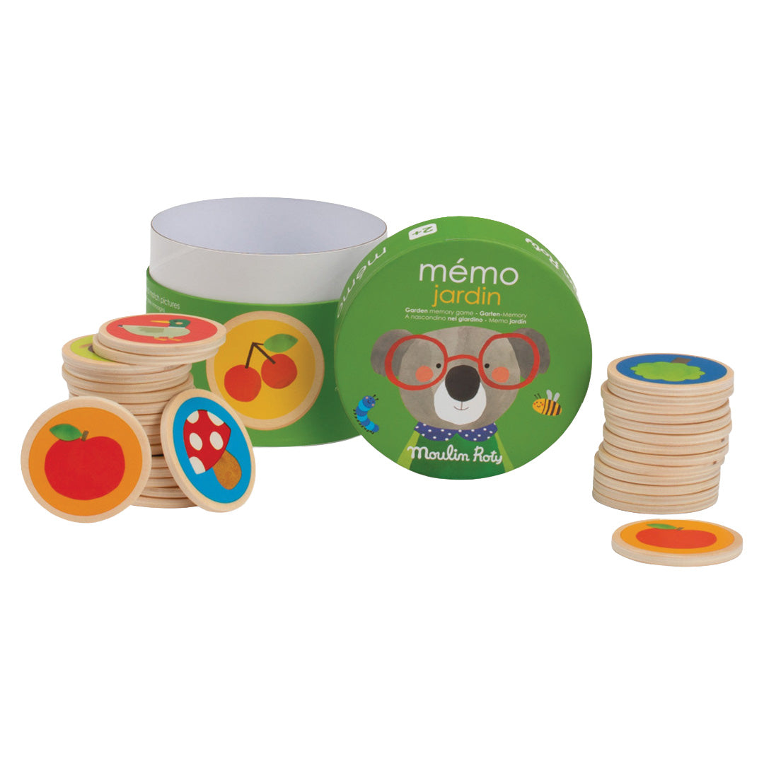 Moulin Roty houten memorie spel met open verpakking en gestapelde tegels.