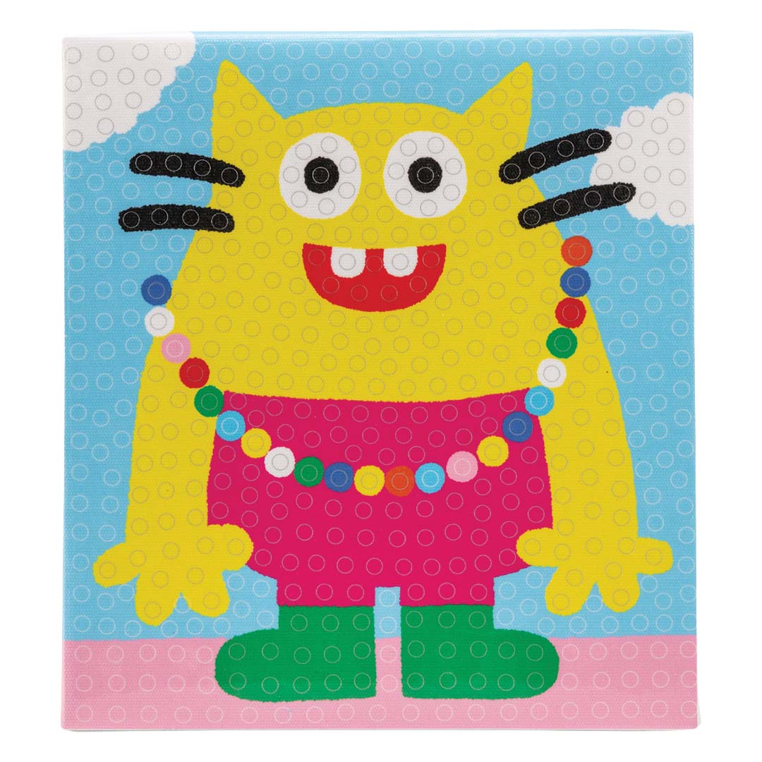 De basisplaat van de pompom knutselset met een geel monsterfiguur en stippenpatroon.