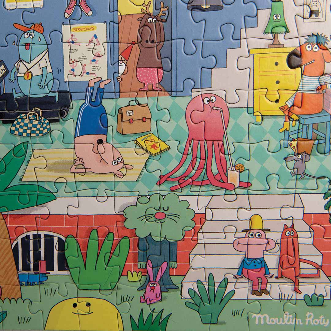 Detail van de Moulin Roty puzzel met cartoonmonsters die buiten en binnen activiteiten doen.