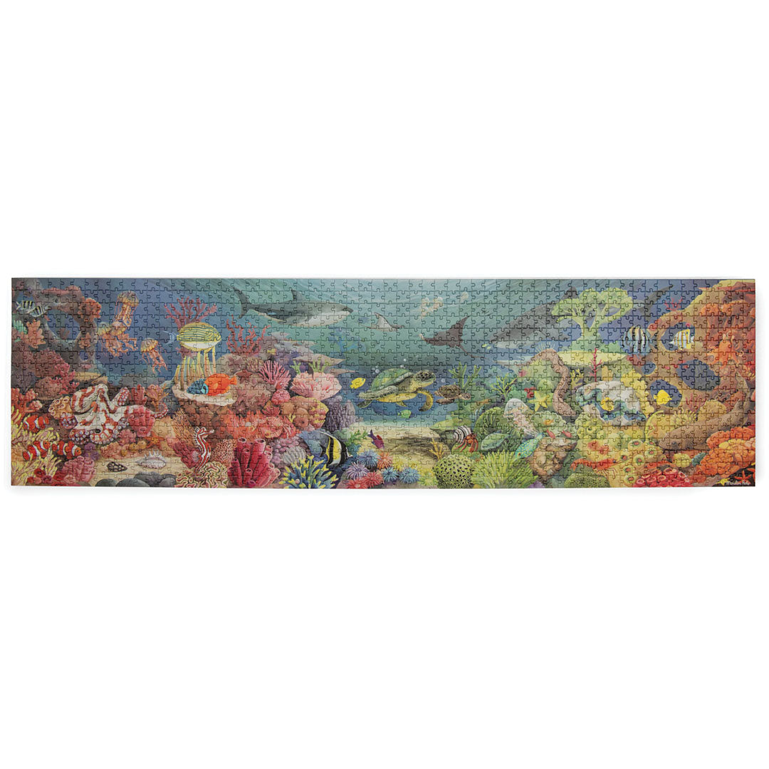 Volledige Moulin Roty legpuzzel van 1000 stukjes met een onderwater koraalrif en zeedieren.