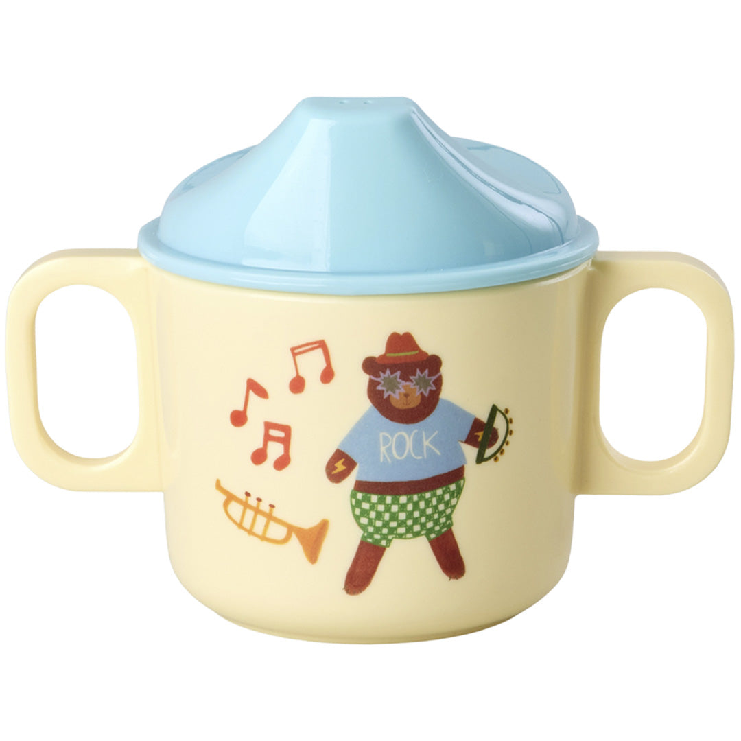 rice tuitbeker met een beige beker, blauwe tuit en een afbeelding van een beer in een muziekband.