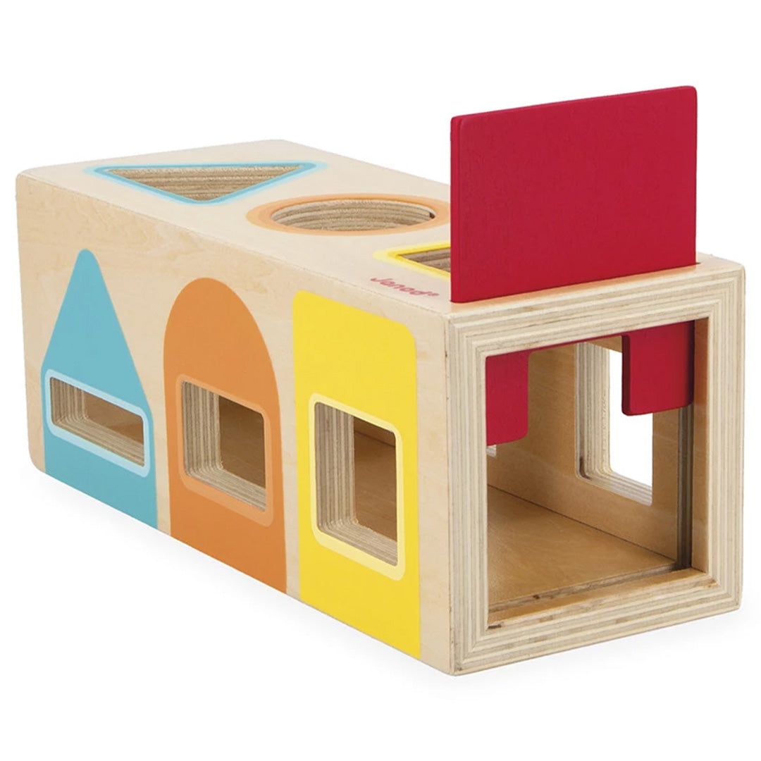 Janod houten vormenstoof met de openingen voor de geometrische vormen zichtbaar.