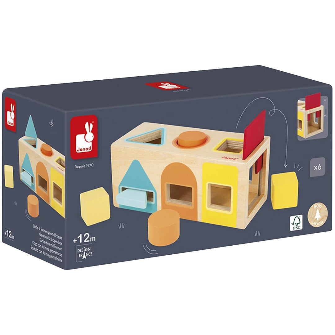 De verpakking van de Janod houten vormenstoof met afbeelding van het speelgoed.