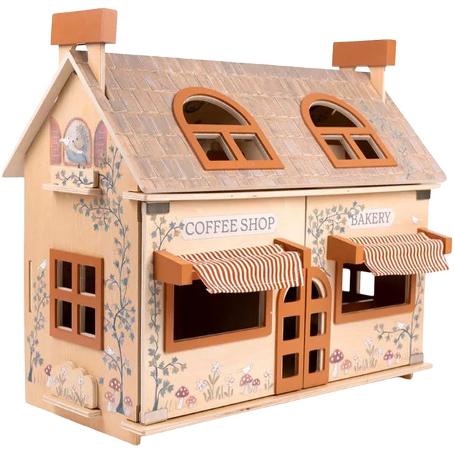 Egmont Toys houten poppenhuis in de vorm van een koffiehuis en bakkerij met gestreepte luifels en geschilderde bladeren.